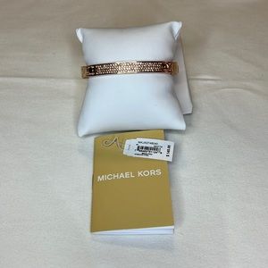 MK Rose Gold Bangle with diamonds.